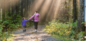 mother and daughter hiking trail